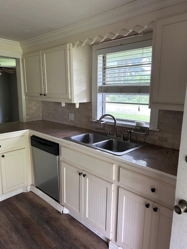 1330 Palmetto Rd, Benton, LA 71006 - kitchen with stainless steel dishwasher, ornamental molding, backsplash, dark wood finished floors, and a ceiling fan