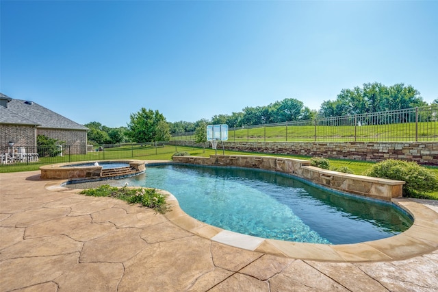 8540 Canyon Xing, Lantana, TX 76226 - view of swimming pool featuring a fenced backyard and a pool with connected hot tub
