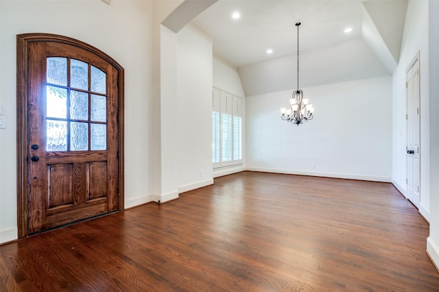 8540 Canyon Xing, Lantana, TX 76226 - foyer entrance with plenty of natural light, dark wood finished floors, a chandelier, arched walkways, and recessed lighting