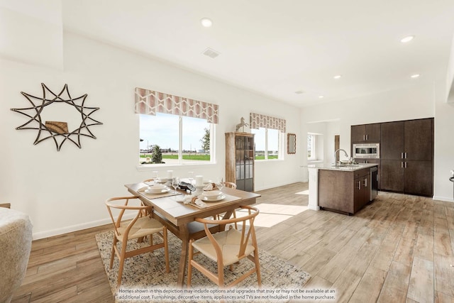 155 Wild Oak Gln, Lavon, TX 75166 - dining area with light wood-type flooring and recessed lighting
