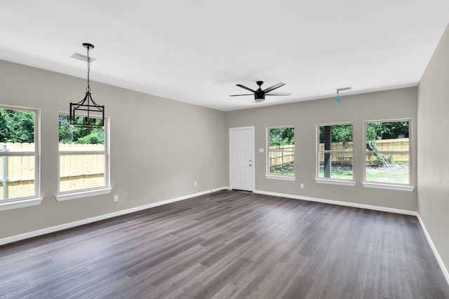 5136 Farnsworth Ave, Fort Worth, TX 76107 - unfurnished room featuring a ceiling fan and dark wood-style flooring