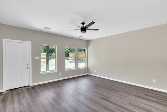 5136 Farnsworth Ave, Fort Worth, TX 76107 - unfurnished room featuring a ceiling fan and dark wood-style flooring