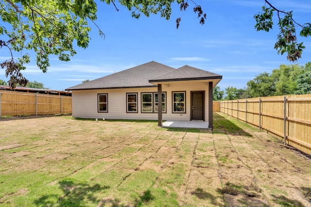 5136 Farnsworth Ave, Fort Worth, TX 76107 - back of property featuring roof with shingles, a fenced backyard, and a patio area