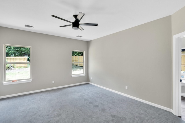 5136 Farnsworth Ave, Fort Worth, TX 76107 - carpeted empty room with healthy amount of natural light and a ceiling fan