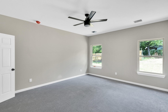 5136 Farnsworth Ave, Fort Worth, TX 76107 - unfurnished room featuring a ceiling fan and dark carpet