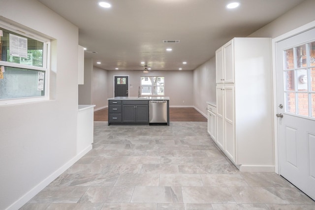 820 Vickie Dr, Azle, TX 76020 - kitchen featuring dishwasher, recessed lighting, ceiling fan, light countertops, and a center island