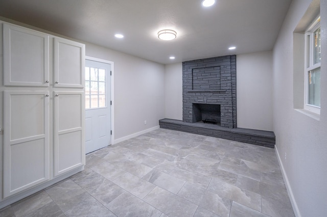 820 Vickie Dr, Azle, TX 76020 - unfurnished living room with a stone fireplace and recessed lighting