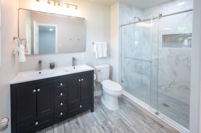 820 Vickie Dr, Azle, TX 76020 - bathroom with a marble finish shower, double vanity, and wood finished floors