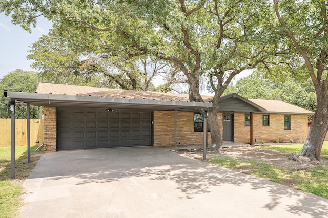 820 Vickie Dr, Azle, TX 76020 - view of front facade with a garage and brick siding