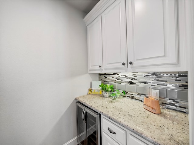604 Rough Creek Dr, Mckinney, TX 75071 - bar area featuring beverage cooler and backsplash