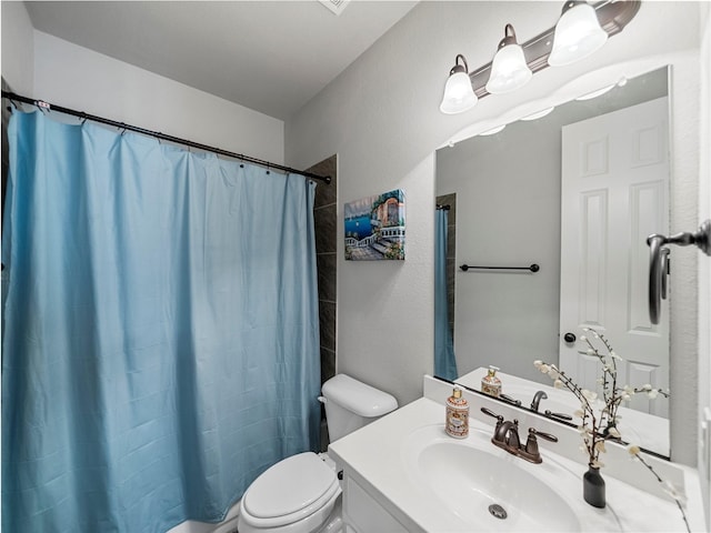 604 Rough Creek Dr, Mckinney, TX 75071 - full bath featuring curtained shower, vanity, and a textured wall