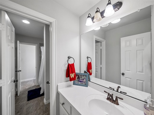 604 Rough Creek Dr, Mckinney, TX 75071 - bathroom with vanity and baseboards