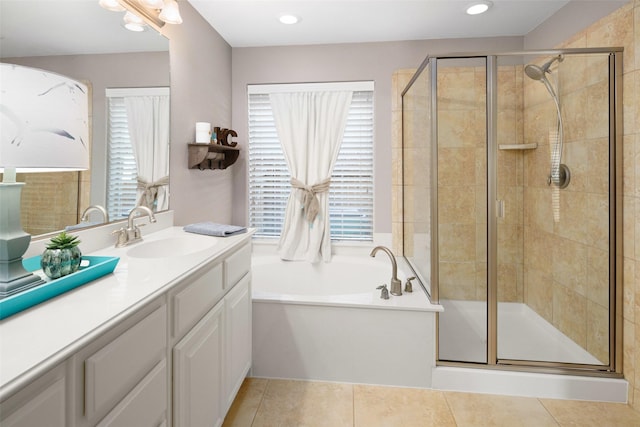 7716 Glenwood Springs Ln, Mckinney, TX 75070 - bathroom featuring vanity, a bath, a shower stall, and plenty of natural light