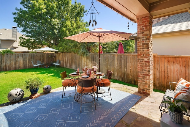 7716 Glenwood Springs Ln, Mckinney, TX 75070 - fenced backyard with a patio area and outdoor dining area