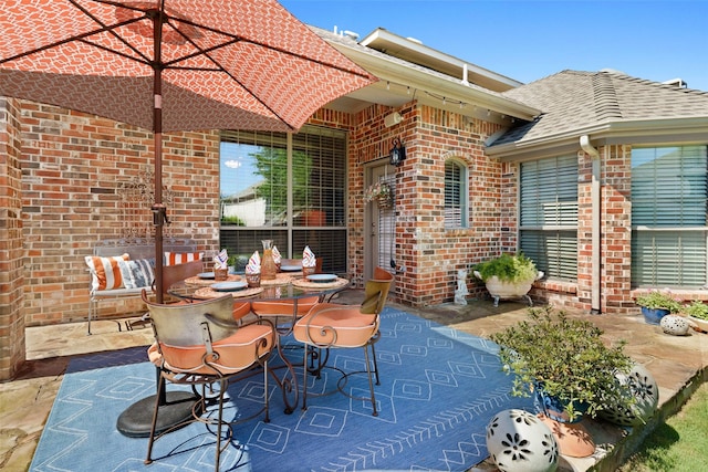7716 Glenwood Springs Ln, Mckinney, TX 75070 - view of patio / terrace featuring outdoor dining space