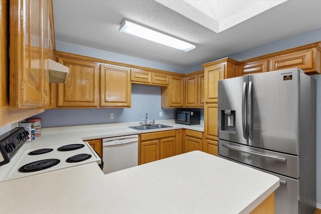 5521 Alta Verde Cir, Arlington, TX 76017 - kitchen with white appliances, light countertops, under cabinet range hood, and a textured ceiling
