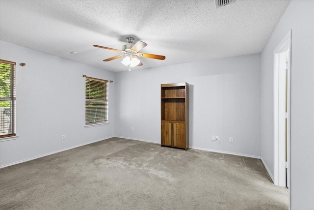 5521 Alta Verde Cir, Arlington, TX 76017 - carpeted empty room featuring a ceiling fan and a textured ceiling