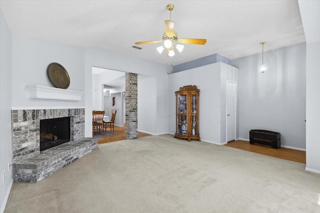 5521 Alta Verde Cir, Arlington, TX 76017 - unfurnished living room with carpet flooring, a fireplace, and ceiling fan