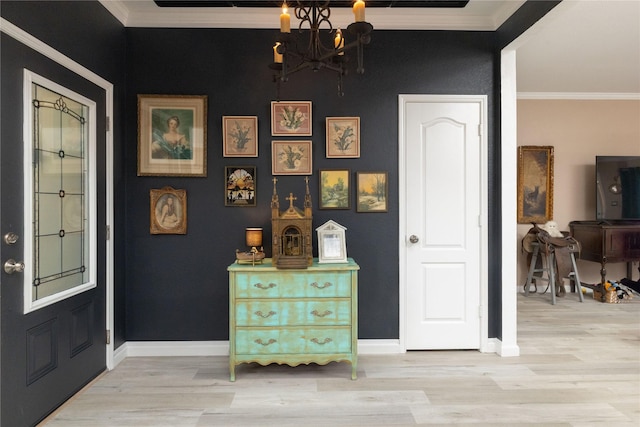 874 Havenbrook Dr, Arlington, TX 76001 - entryway with light wood-style floors, a chandelier, and crown molding
