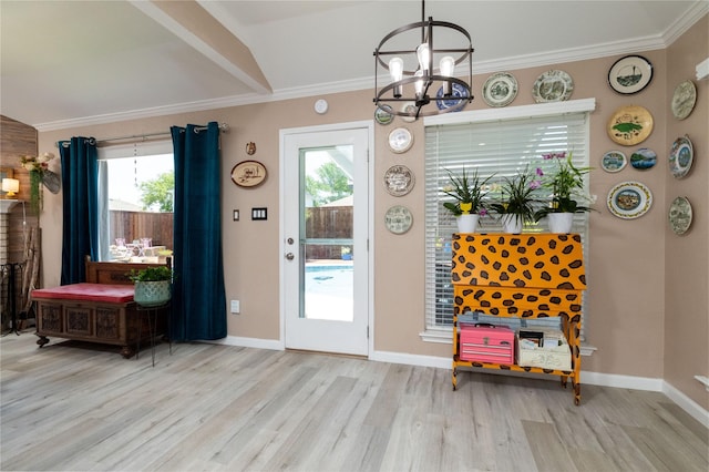 874 Havenbrook Dr, Arlington, TX 76001 - entrance foyer with wood finished floors, healthy amount of natural light, a chandelier, and crown molding