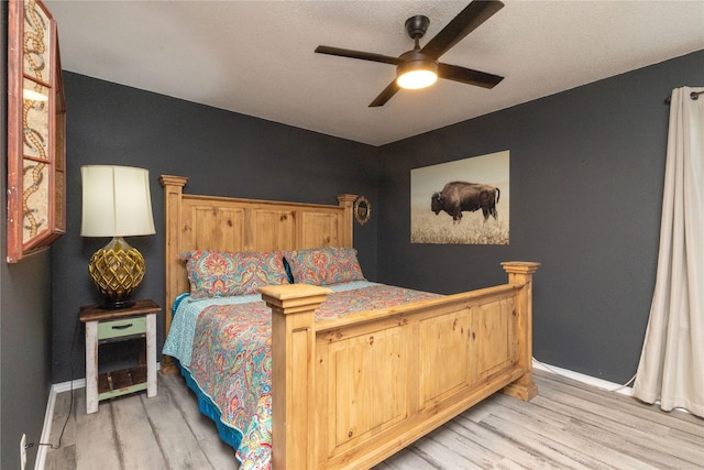 874 Havenbrook Dr, Arlington, TX 76001 - bedroom featuring light wood-style flooring and ceiling fan