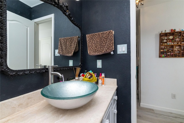 874 Havenbrook Dr, Arlington, TX 76001 - bathroom featuring wood finished floors and vanity