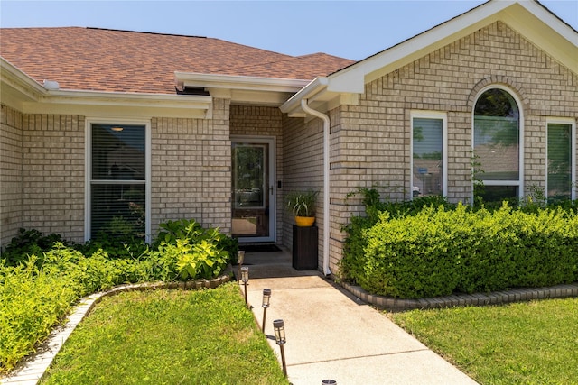 874 Havenbrook Dr, Arlington, TX 76001 - entrance to property featuring a shingled roof and brick siding