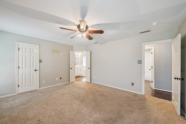 17 Zachary Ct, Mansfield, TX 76063 - unfurnished bedroom with carpet flooring, connected bathroom, and a ceiling fan