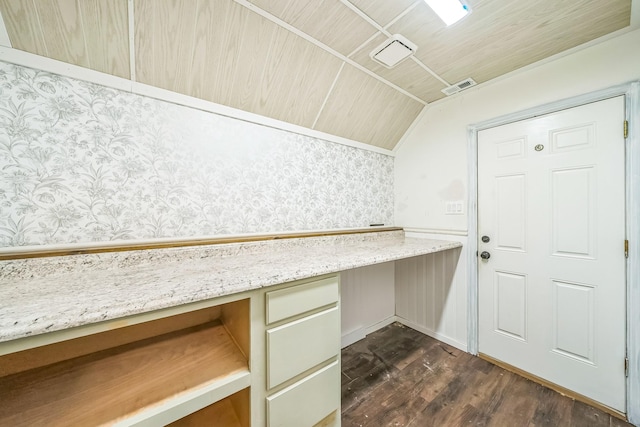 17 Zachary Ct, Mansfield, TX 76063 - laundry room with wallpapered walls, dark wood finished floors, and a desk