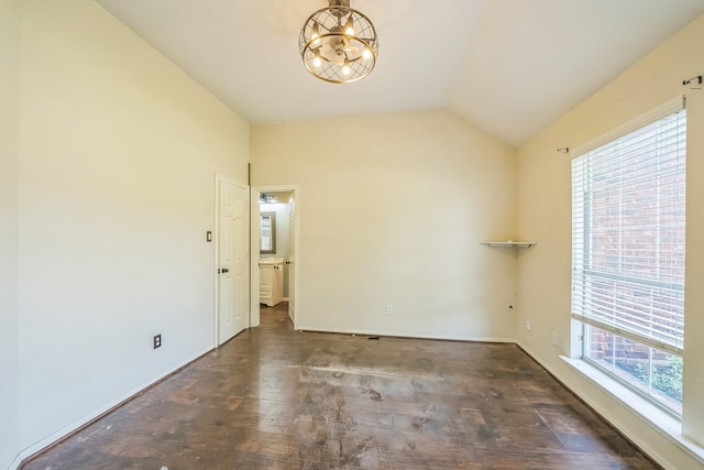 17 Zachary Ct, Mansfield, TX 76063 - spare room with a chandelier, wood finished floors, and lofted ceiling
