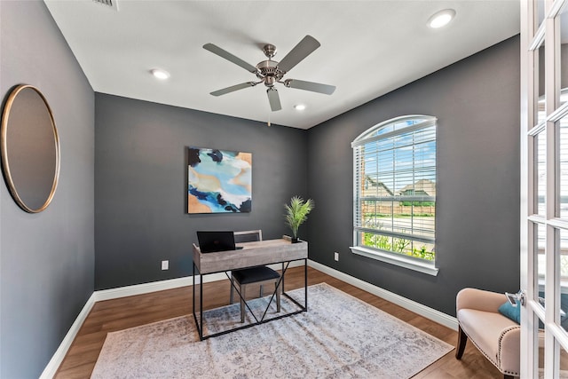 8133 Blumelia Dr, Dallas, TX 75252 - office featuring healthy amount of natural light, wood finished floors, a ceiling fan, and recessed lighting