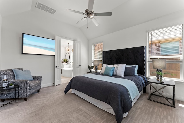 8133 Blumelia Dr, Dallas, TX 75252 - carpeted bedroom featuring lofted ceiling, multiple windows, a ceiling fan, and ensuite bathroom