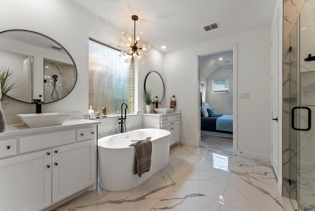 8133 Blumelia Dr, Dallas, TX 75252 - ensuite bathroom with vanity, a marble finish shower, marble tiled flooring, a freestanding tub, and recessed lighting