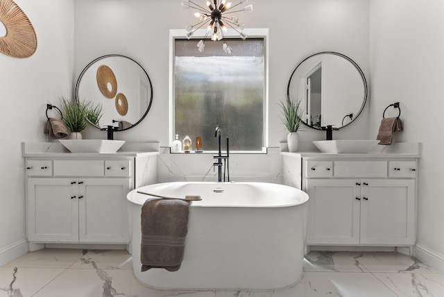 8133 Blumelia Dr, Dallas, TX 75252 - full bath with marble finish floors, a chandelier, and two vanities