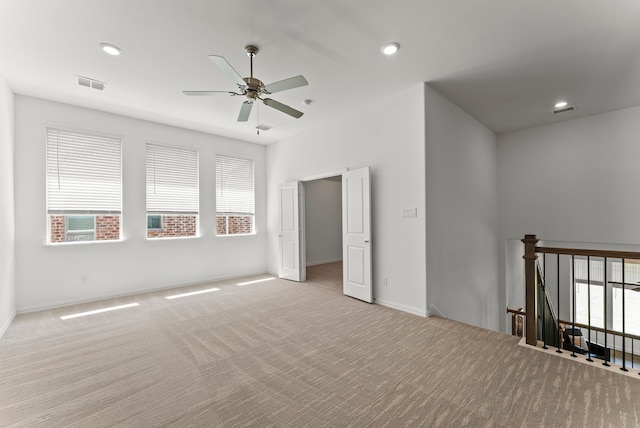 8133 Blumelia Dr, Dallas, TX 75252 - unfurnished room with light carpet, a ceiling fan, and recessed lighting