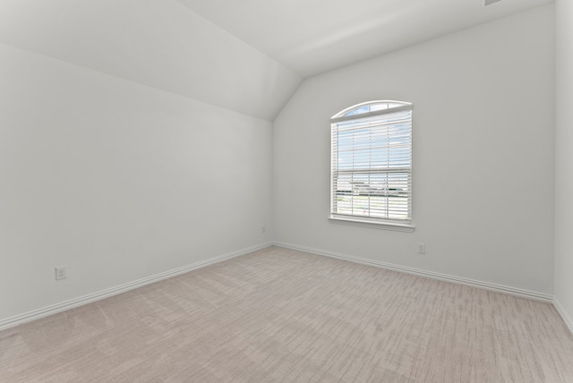 8133 Blumelia Dr, Dallas, TX 75252 - empty room with lofted ceiling and light carpet