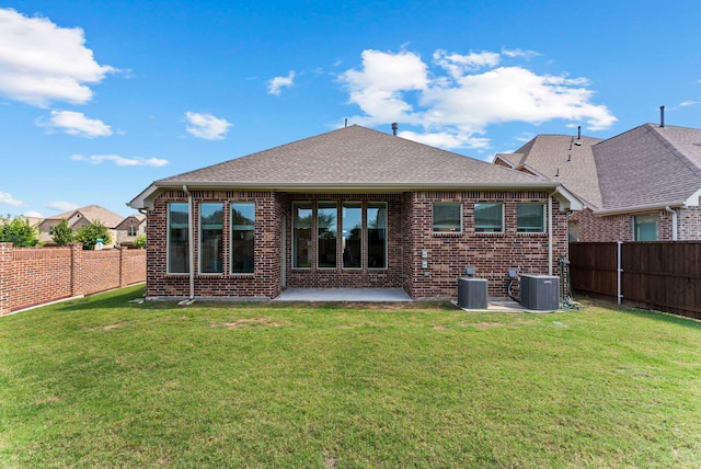 8133 Blumelia Dr, Dallas, TX 75252 - rear view of property with a fenced backyard, brick siding, a patio, and roof with shingles