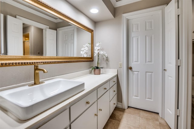 100 La Paz Ct, Irving, TX 75062 - bathroom featuring vanity, ornamental molding, and tile patterned flooring
