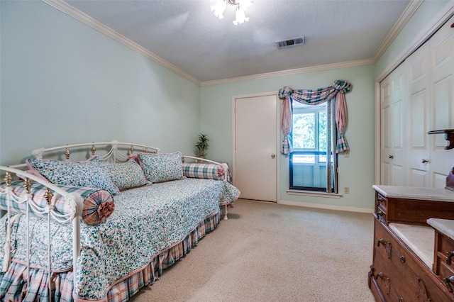 100 La Paz Ct, Irving, TX 75062 - bedroom featuring crown molding, carpet floors, and a closet