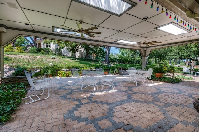 100 La Paz Ct, Irving, TX 75062 - view of patio featuring outdoor dining area and a ceiling fan