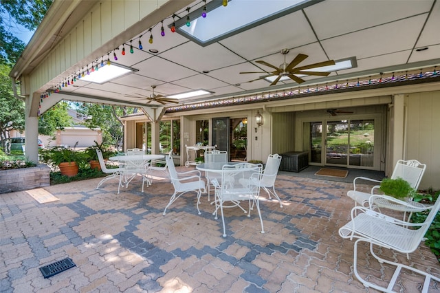 100 La Paz Ct, Irving, TX 75062 - view of patio with outdoor dining space and ceiling fan