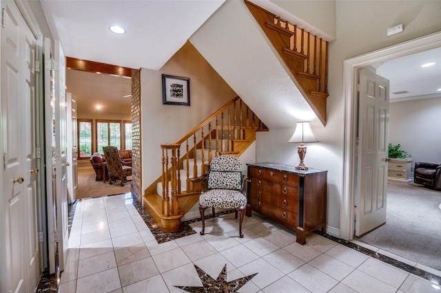 100 La Paz Ct, Irving, TX 75062 - entrance foyer with stairway, recessed lighting, light tile patterned floors, and light carpet