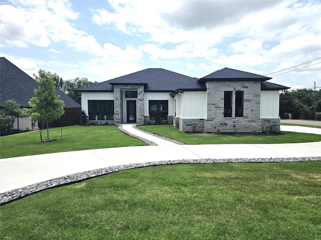 7900 Turner Dr, North Richland Hills, TX 76182 - view of front of house with stone siding, board and batten siding, and a shingled roof