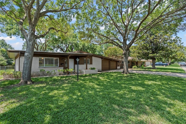 7005 Culver Ave, Fort Worth, TX 76116 - view of front of property with a garage, a front yard, driveway, and brick siding