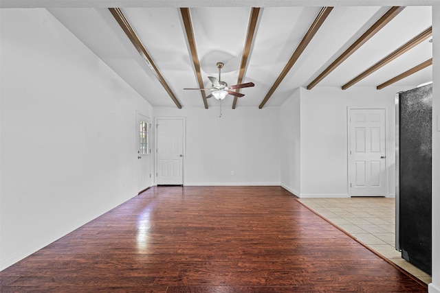7005 Culver Ave, Fort Worth, TX 76116 - unfurnished living room featuring beam ceiling, ceiling fan, and light wood finished floors