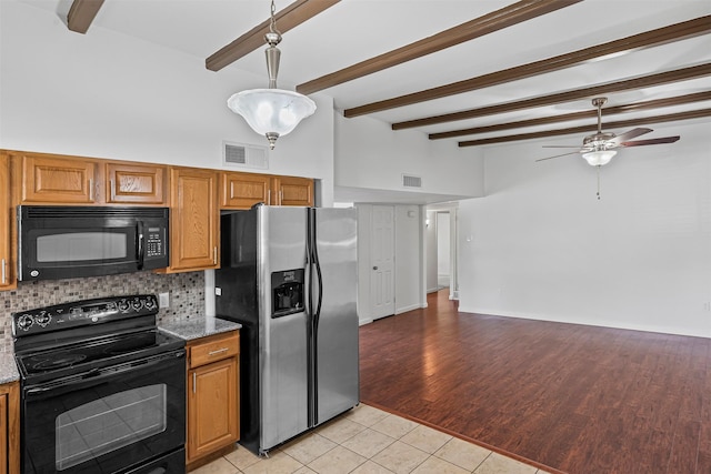 7005 Culver Ave, Fort Worth, TX 76116 - kitchen featuring black appliances, ceiling fan, light tile patterned floors, decorative backsplash, and light stone countertops