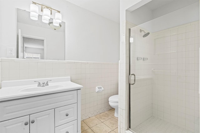 7005 Culver Ave, Fort Worth, TX 76116 - full bathroom featuring tile walls, a shower stall, vanity, tile patterned flooring, and wainscoting