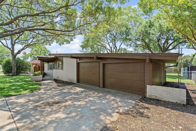 7005 Culver Ave, Fort Worth, TX 76116 - mid-century home with driveway, brick siding, and an attached garage