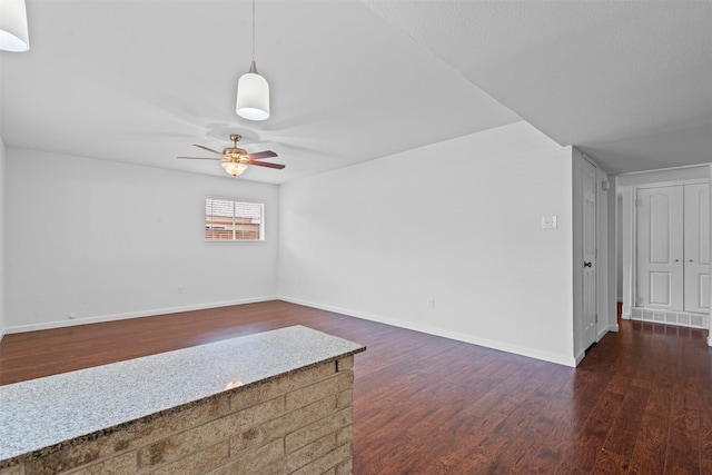 7005 Culver Ave, Fort Worth, TX 76116 - unfurnished room featuring ceiling fan and dark wood-style floors