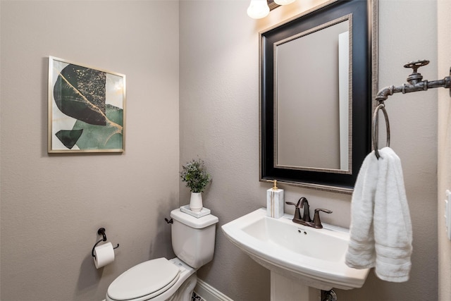 3208 Twin Eagles Dr, Celina, TX 75009 - half bathroom with toilet and a sink
